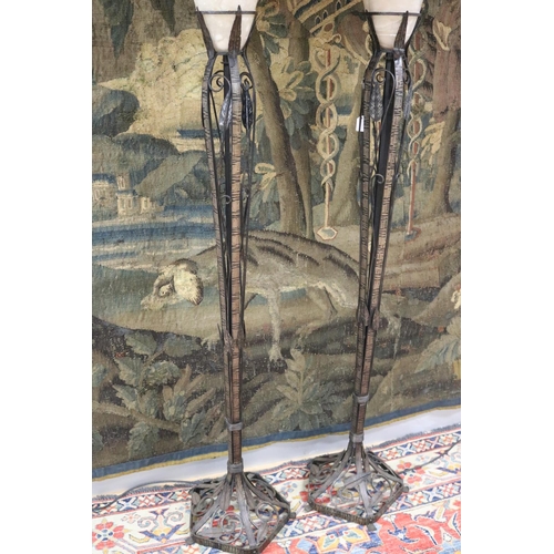 134 - Pair of French Art Deco wrought iron and alabaster shade floor lamps, in the style of EDGAR BRANDT (... 