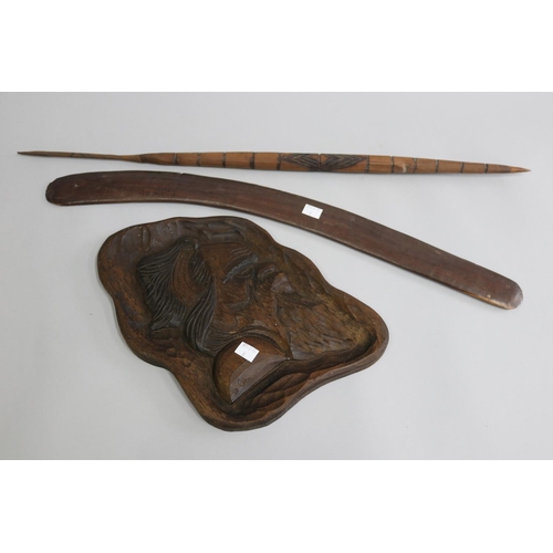 3210 - Old hardwood Aboriginal boomerang along with a spear head, carved Aboriginal head profile panel (3)