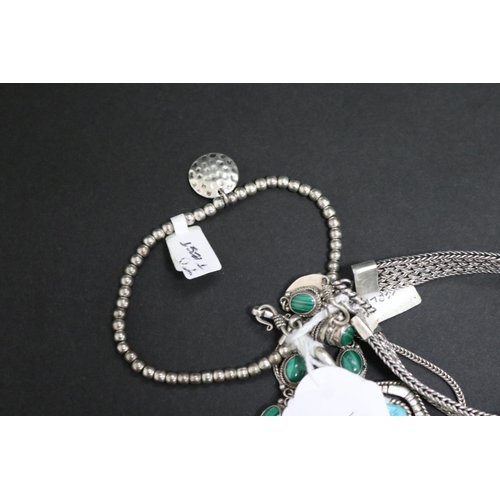 31 - Three bracelets, mostly silver, and a silver amethyst necklace and turquoise pendant (5)