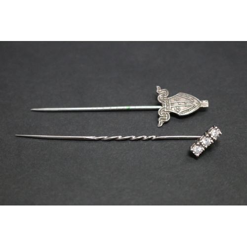 49 - Two tie pins, one form of bishop’s mitre silver marked 925, the other triparted diamond setting? (2)