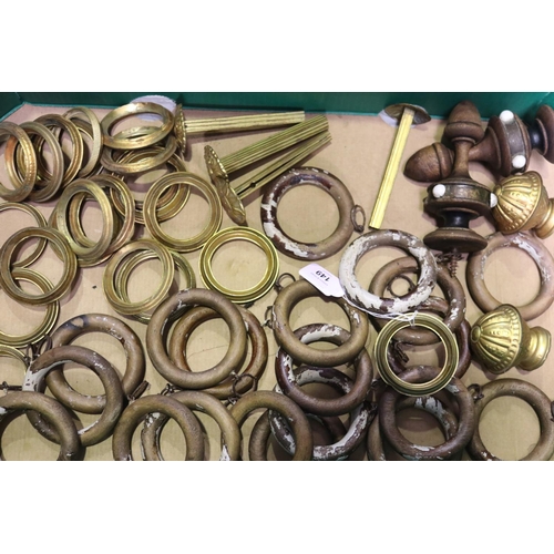 149 - Large quantity of 19th century gilt brass curtain tie backs, rings and rod finial together with a qu... 