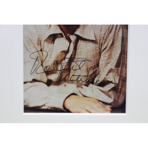 192 - Robert Charles Durman Mitchum (August 6, 1917 - July 1, 1997) Signed colour photograph. He was an Am... 