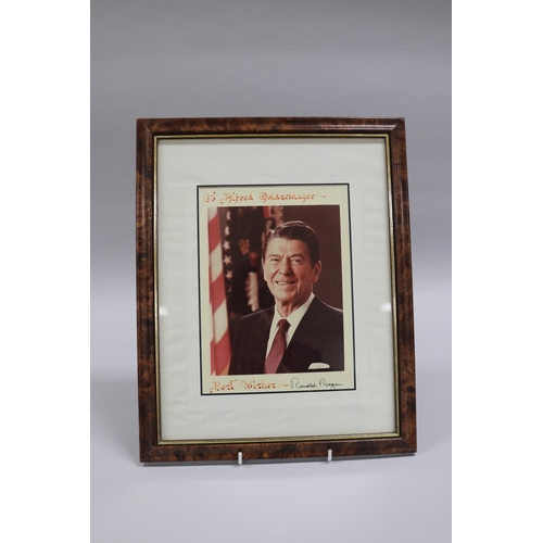 199 - Ronald Wilson Reagan (February 6, 1911 - June 5, 2004) Presented signed press photograph. Ronald Rea... 