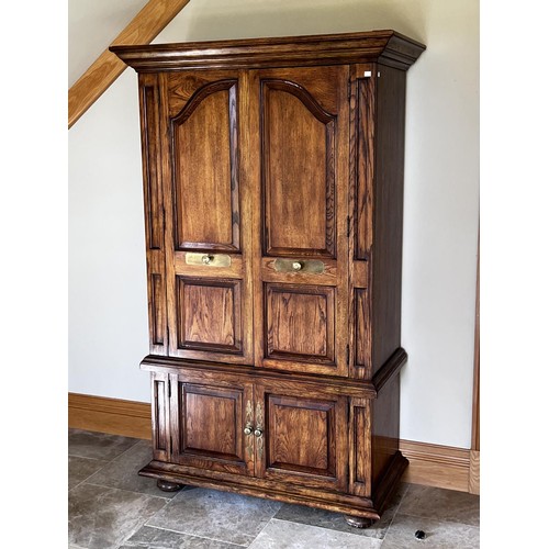 88 - Oak wardrobe with panel doors brass fitting pidgeon hole and drawer interior, approx 188cm H x 113cm... 