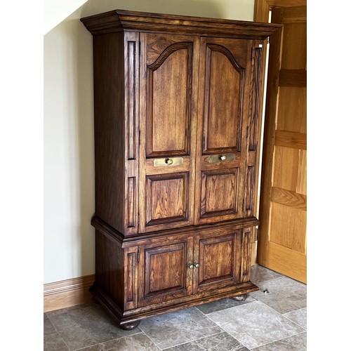 88 - Oak wardrobe with panel doors brass fitting pidgeon hole and drawer interior, approx 188cm H x 113cm... 