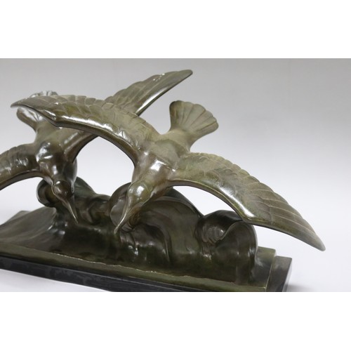 224 - Louis Sosson (-) France, bronze sculpture of two seagulls riding a wave, on marble base, approx 27cm... 
