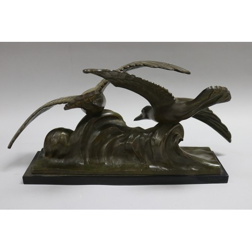 224 - Louis Sosson (-) France, bronze sculpture of two seagulls riding a wave, on marble base, approx 27cm... 