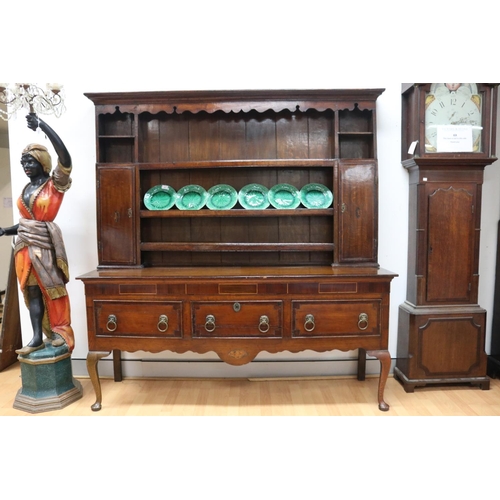 227 - Antique late 18th century oak and mahogany cross banded three drawer dresser, the open central shelf... 