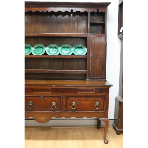 227 - Antique late 18th century oak and mahogany cross banded three drawer dresser, the open central shelf... 