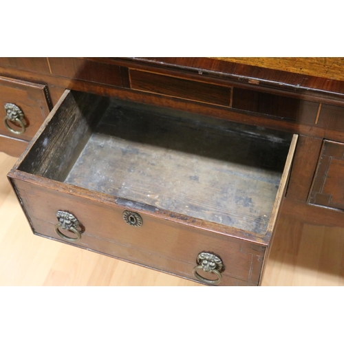 227 - Antique late 18th century oak and mahogany cross banded three drawer dresser, the open central shelf... 