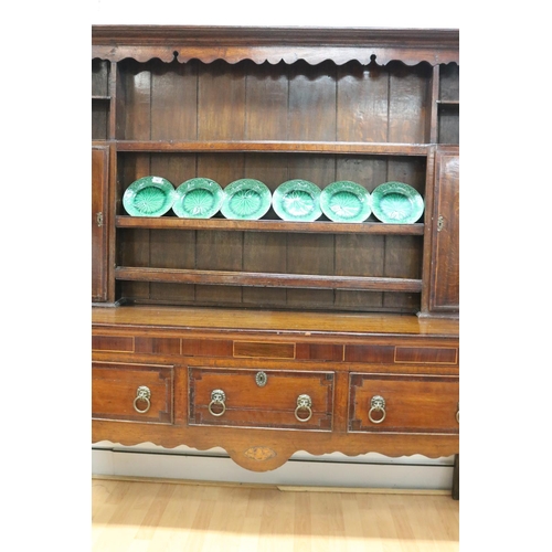 227 - Antique late 18th century oak and mahogany cross banded three drawer dresser, the open central shelf... 