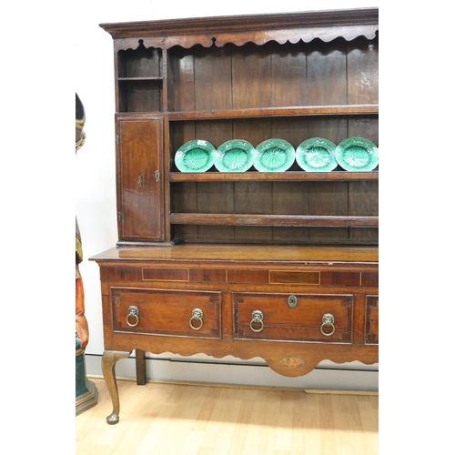 227 - Antique late 18th century oak and mahogany cross banded three drawer dresser, the open central shelf... 