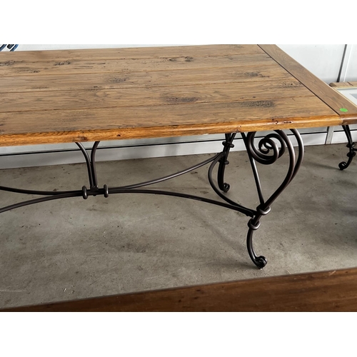 25 - Good quality long oak topped dining table, with hand forged elaborate wrought iron base, approx 78cm... 
