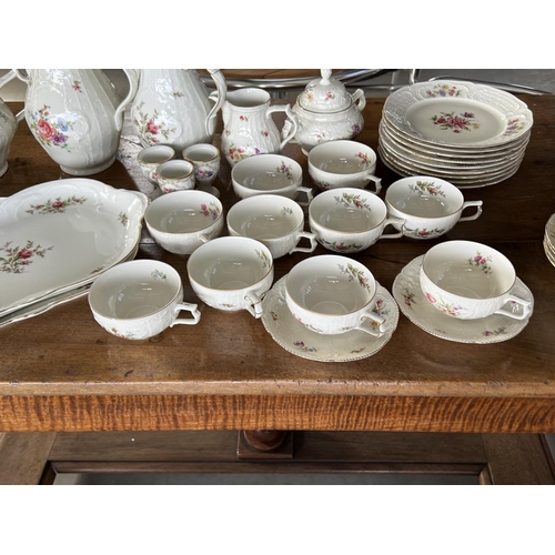 28 - Extensive Rosenthal porcelain part service, comprising tea pot, coffee pots, platters, side plates, ... 