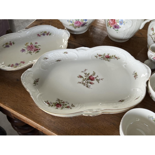 28 - Extensive Rosenthal porcelain part service, comprising tea pot, coffee pots, platters, side plates, ... 