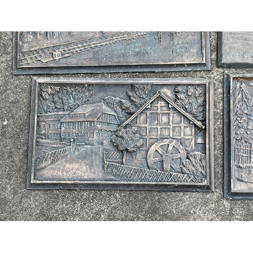 44 - Four cast bronze plaques (4), approx 53cm L x 29cm H & smaller