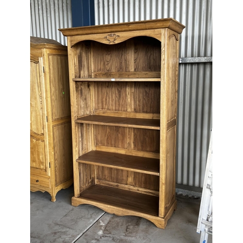 6 - Modern French style oak open shelf bookcase, approx 211cm H x 128cm W x 53cm D