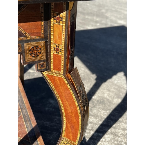 9 - Antique Middle eastern fold over games table. (Damages), approx 69cm H x 64cm W x 34cm D