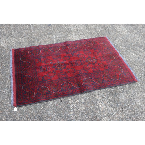 278 - Afghan Khal handmade carpet, approx 97cm x 163cm