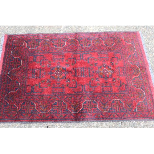 278 - Afghan Khal handmade carpet, approx 97cm x 163cm