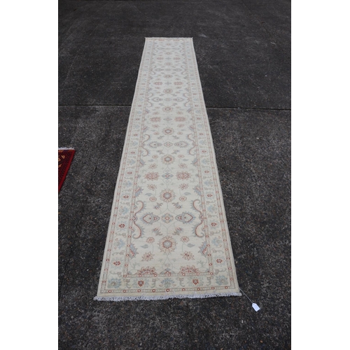 275 - Afghan handmade Chobi carpet, approx 78cm x 435cm