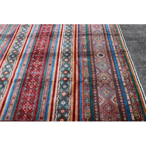 279 - Fine Afghan handmade Chobi carpet, approx 208cm x 308cm