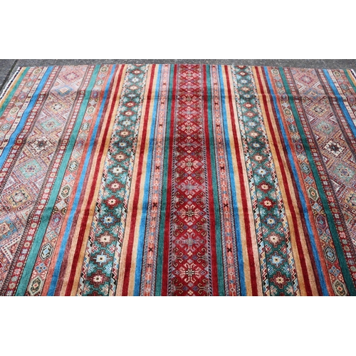 279 - Fine Afghan handmade Chobi carpet, approx 208cm x 308cm