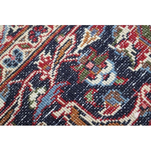 284 - Large Persian handmade Kashah carpet of red ground, approx 298cm x 378cm