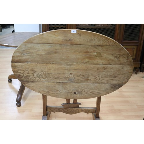 67 - Antique French oak oval shape folding vignerons table, approx 73cm H x 108cm W x 67cm D