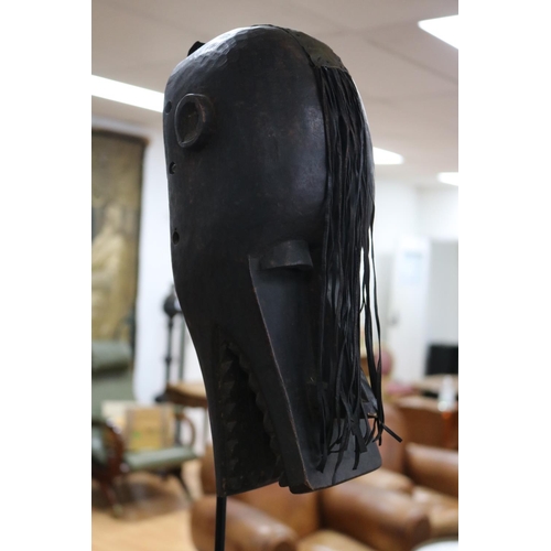 301 - Carved wood African mask on stand, approx 31cm H (ex stand)