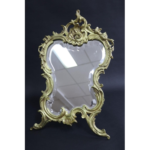 104 - French Rococo revival waisted shape boudoir mirror with easel back, approx 53cm H x 32cm W
