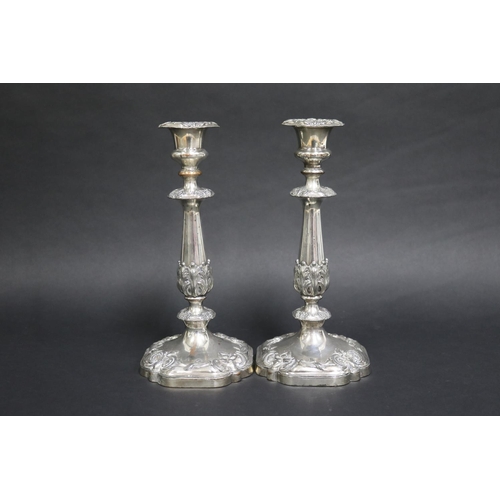 125 - Pair of antique candlesticks, Sheffield plate, marked with impressed bell, each approx 27cm H (2)