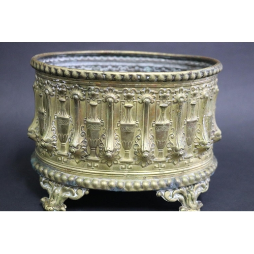 160 - Antique French Napoleon III embossed brass jardiniere decorated with twin handled urns and floral de... 