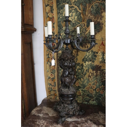 240 - Most impressive large pair of French figural putti candelabras, five lights to each, unknown working... 