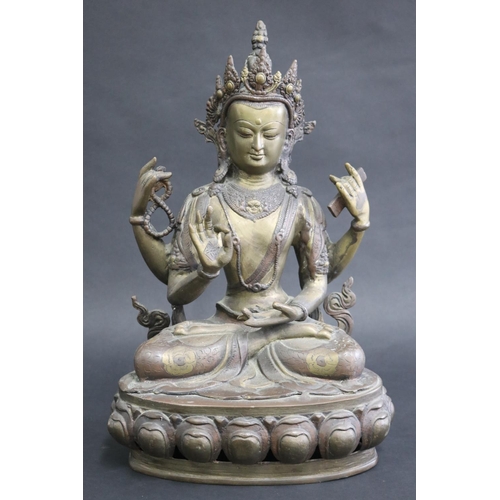 317 - Tibetan bronze Buddhist Deity (Four-Armed Avalokiteshvara) well cast in sections, seated on a single... 