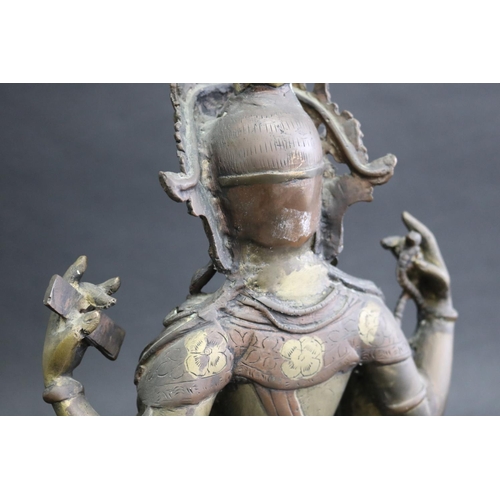 317 - Tibetan bronze Buddhist Deity (Four-Armed Avalokiteshvara) well cast in sections, seated on a single... 