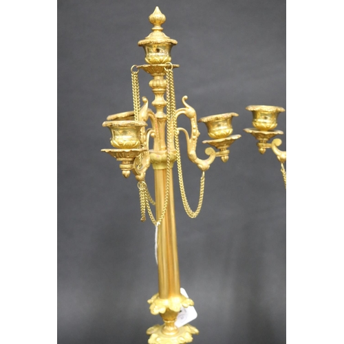 101 - Pair of French fine quality gilt brass four stick candelabras, with applied drop chains, each approx... 