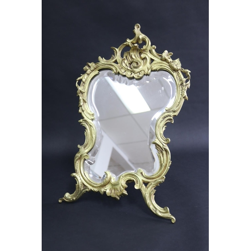 104 - French Rococo revival waisted shape boudoir mirror with easel back, approx 53cm H x 32cm W
