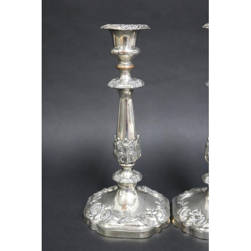 125 - Pair of antique candlesticks, Sheffield plate, marked with impressed bell, each approx 27cm H (2)