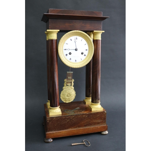 179 - Antique French Napoleon III portico mantle clock (running at time of inspection), has pendulum and h... 