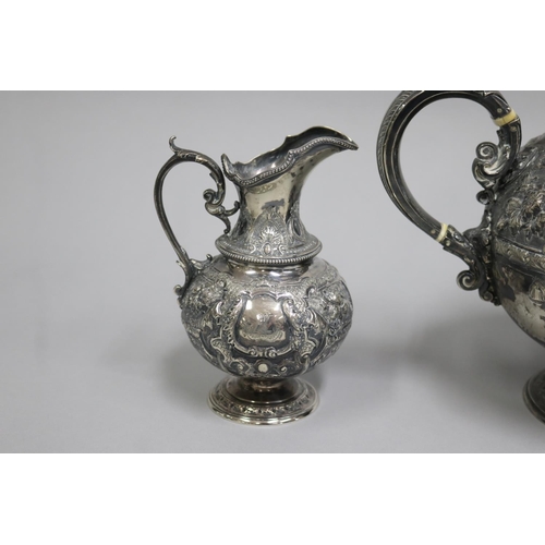 2 - Antique mid Victorian sterling silver three piece tea service, comprising a teapot, open sugar, and ... 