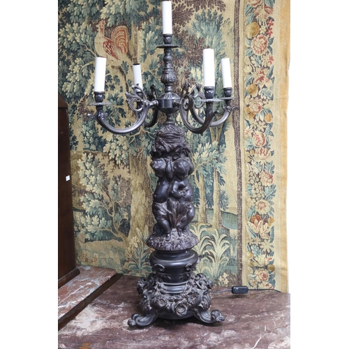 240 - Most impressive large pair of French figural putti candelabras, five lights to each, unknown working... 