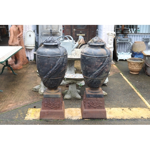 265 - Most impressive antique French cast iron garden urns with lids, standing on pedestal bases, each app... 