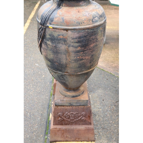 265 - Most impressive antique French cast iron garden urns with lids, standing on pedestal bases, each app... 