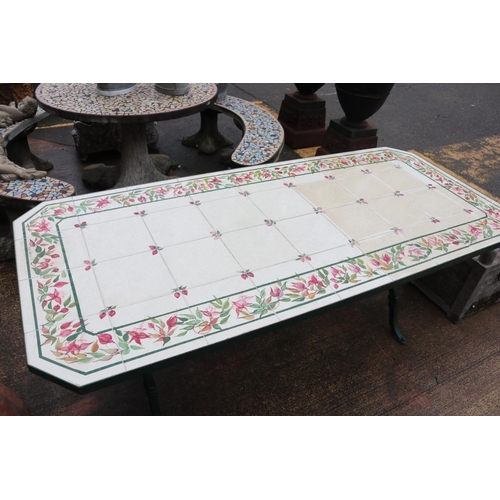 266 - Large French cast iron base bistro table with hand painted Fushsia tiles to top, signed 