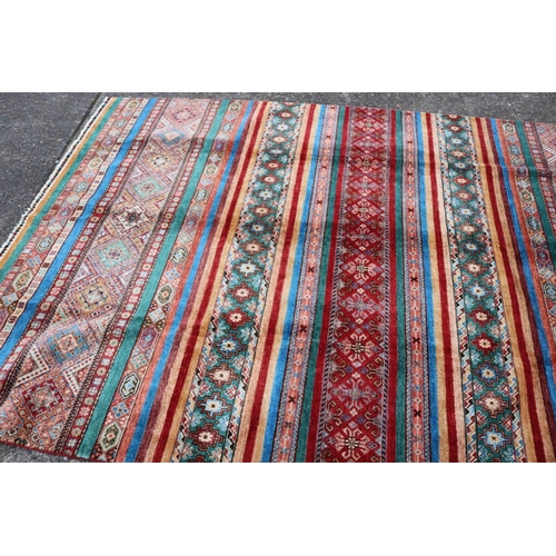 279 - Fine Afghan handmade Chobi carpet, approx 208cm x 308cm