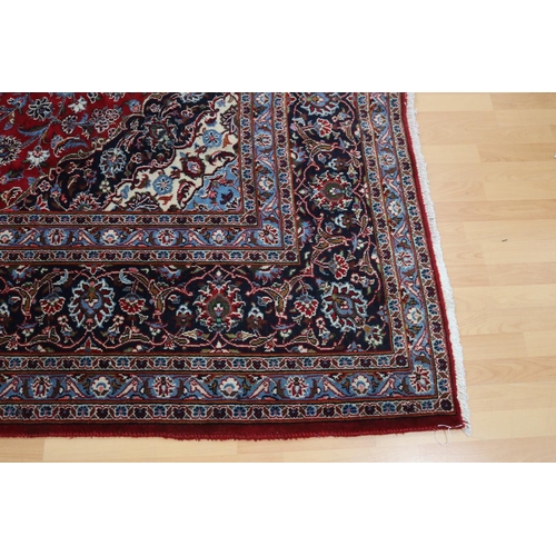 284 - Large Persian handmade Kashah carpet of red ground, approx 298cm x 378cm