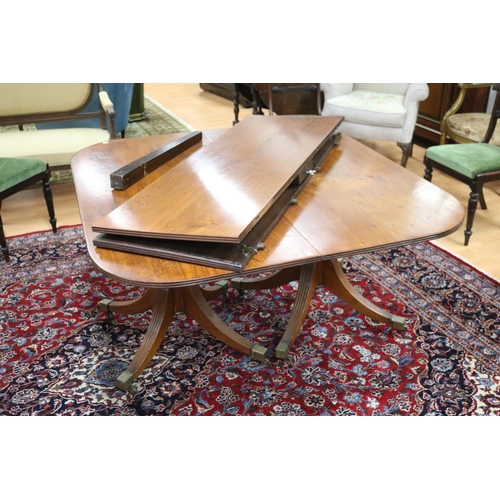 285 - Regency revival quality twin pedestal extension dining table with two extra leaves, wood appears to ... 