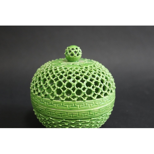 334 - Reticulated Oriental green porcelain lidded pot with closed base, approx 14cm H x 13cm Dia