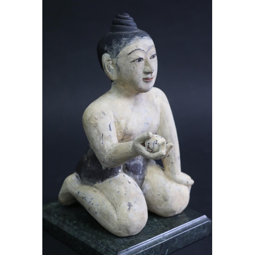 340 - South East Asian carved painted wood seated figure on marble base, approx 21cm H (ex base)